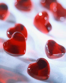 Открытка ко дню святого Валентина с сердечками в виде гранатовых зёрен